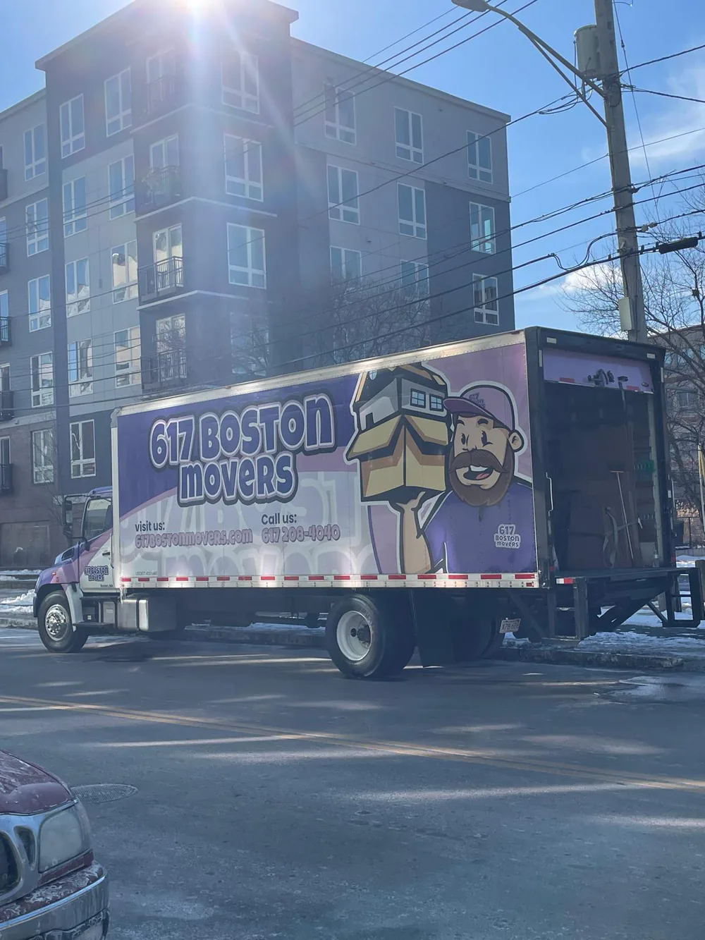 617 Boston Movers truck on a Boston street